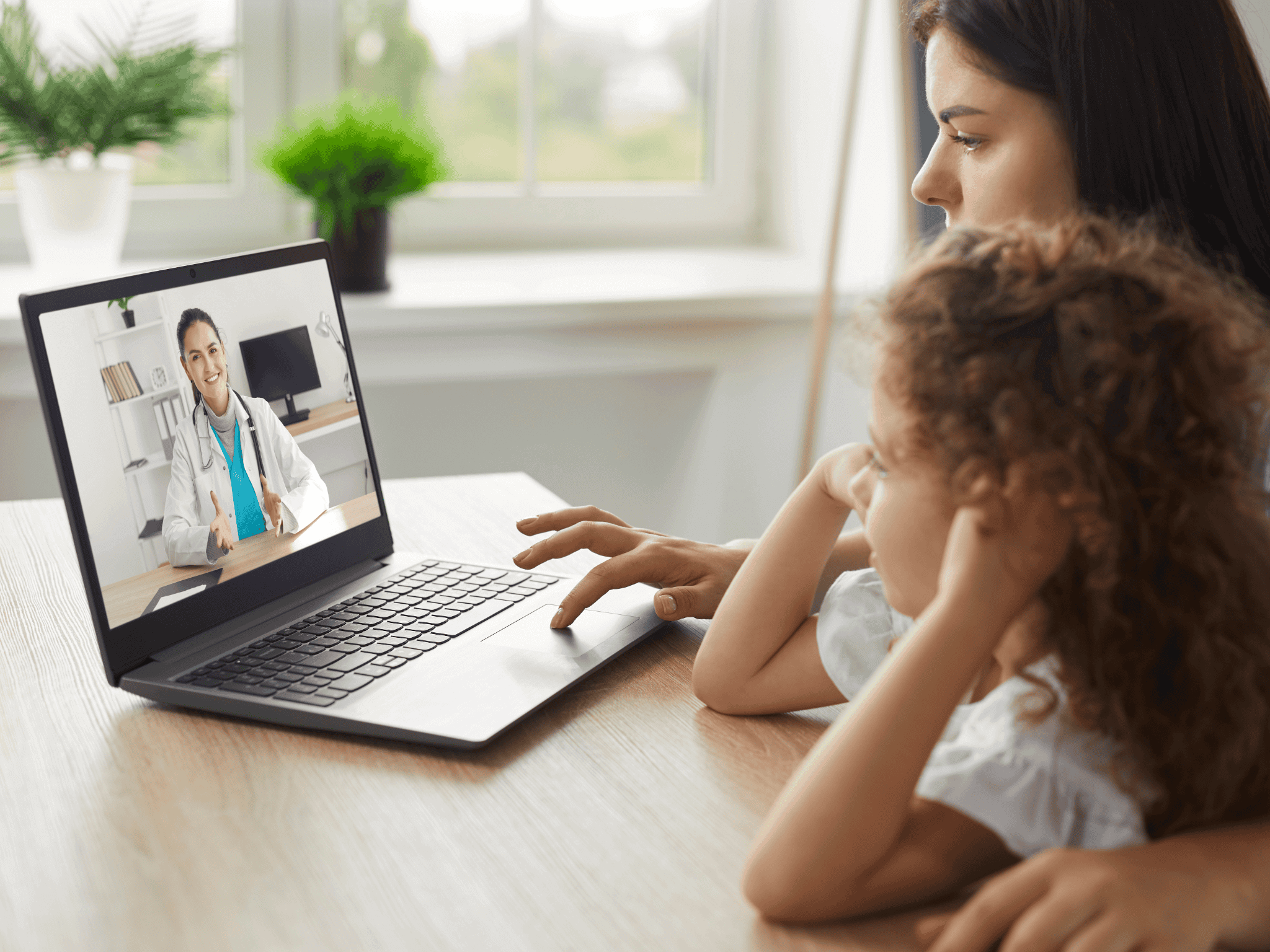 Mother and child on virtual consultation with a pharmacist